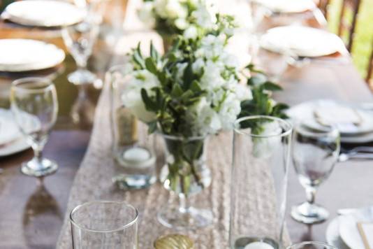 Table setting - sequin runner, modern elegant china, lush white flowers