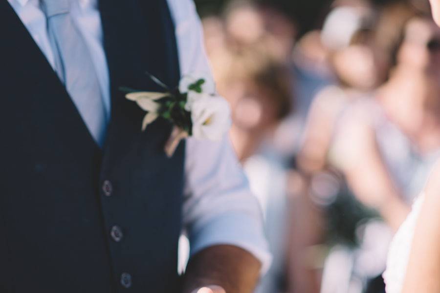 Holding the guest-of-honor's hand