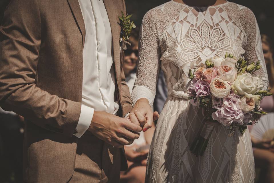 Newlyweds holding hands