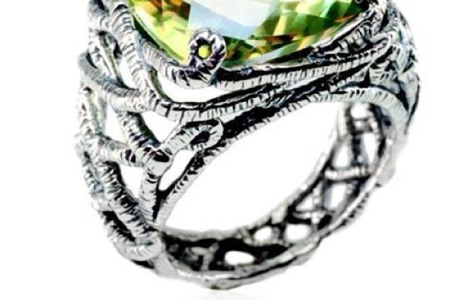 12 carats of Peridot in a handcrafted sterling silver setting.  Breathtaking!