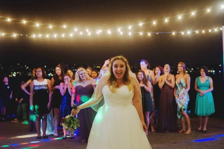 Bride tossing her bouquet