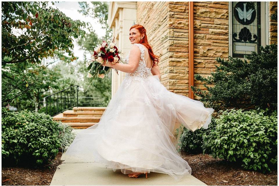 Bride walking with her bouquet