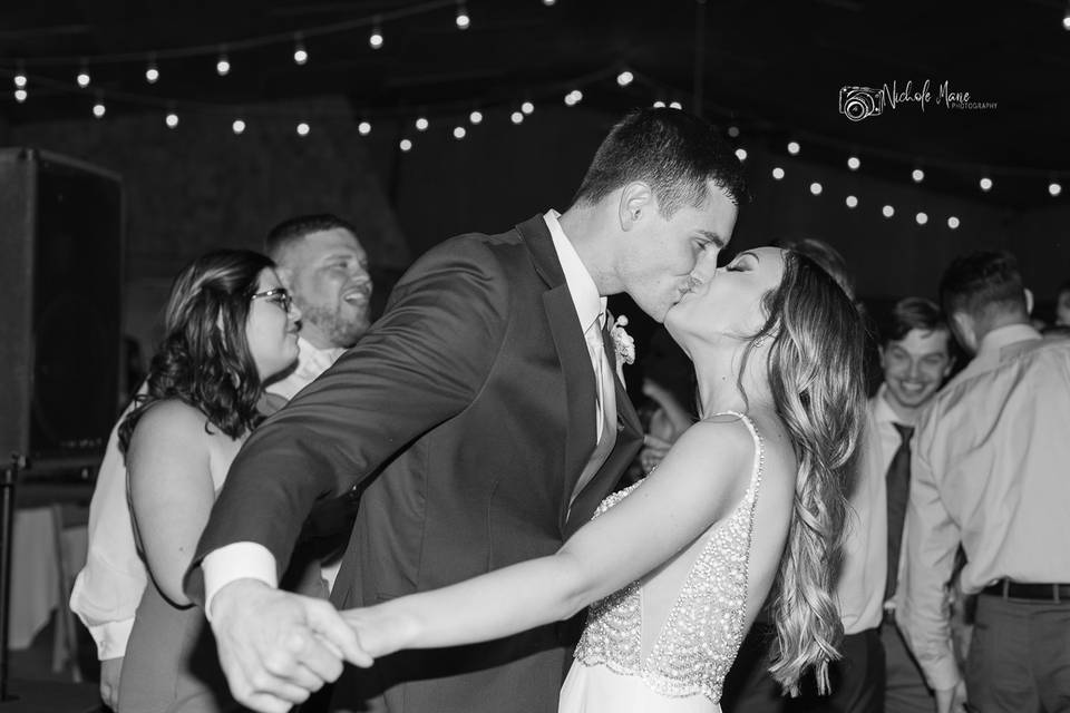 Couple kissing on dance floor