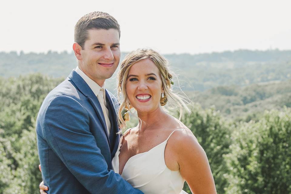 Couple by the hillside