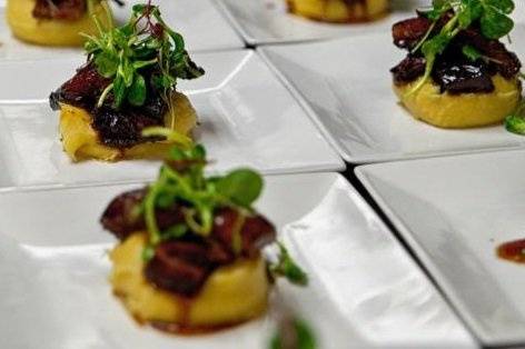 Braised Lamb Ribs, Creamy Polenta, Micro Greens