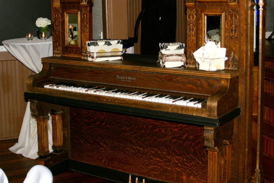 Our vintage upright baby grand piano is now a wine bar...   and it is fabulous!!