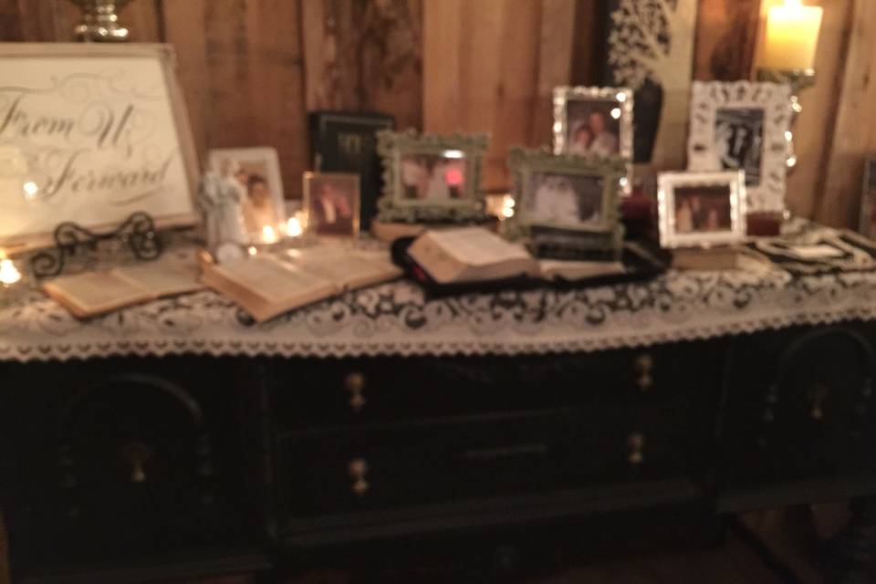 We loved working with this most lovely bride and her fabulous mother.  They used our vintage black buffet to create the most beautifully done memory table we have ever seen.