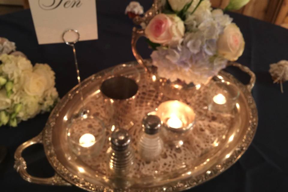 We loved working with this most lovely bride and her fabulous mother.  We used our vintage silver and mercury glass to assist them in creating these gorgeous, romantic centerpieces.  (Flowers by Lisa Akins of Sacred Stone)