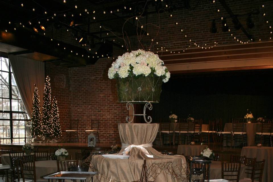 We so enjoyed designing the layout for this Christmas-themed reception held at a museum in Fayetteville, TN.  Classy, romantic, vintage, rustic...   it was gorgeous!  We designed this three-tiered clover-leaf table for serving the food.