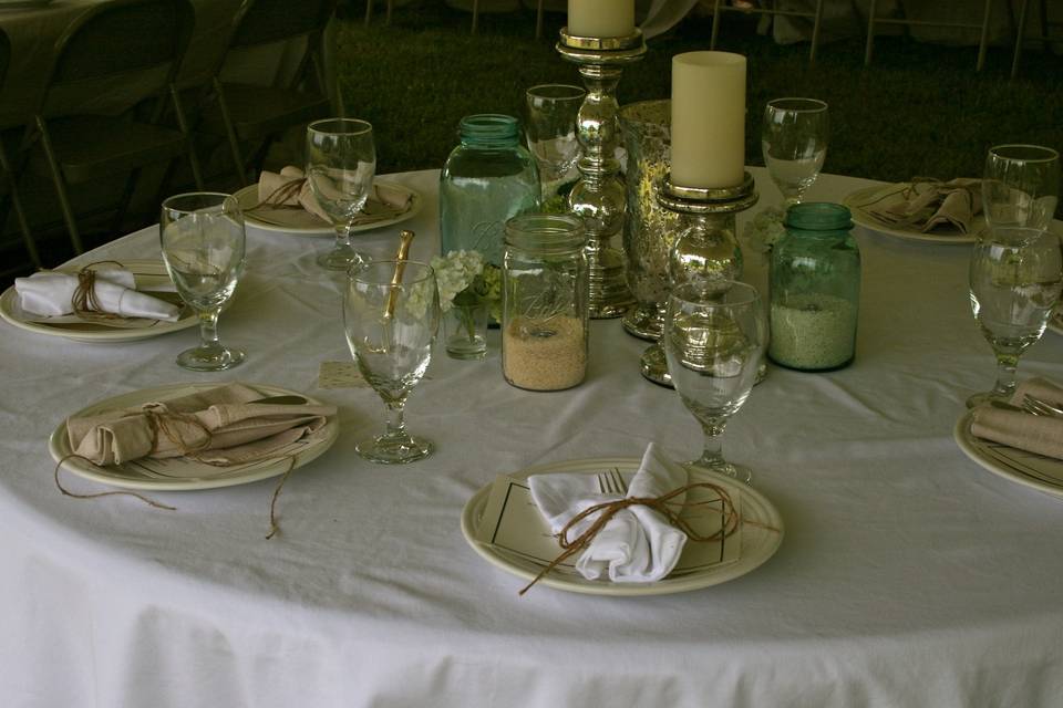 A spring garden wedding with lots of rustic, vintage, shabby-chic details.  The guest tables were gorgeous!