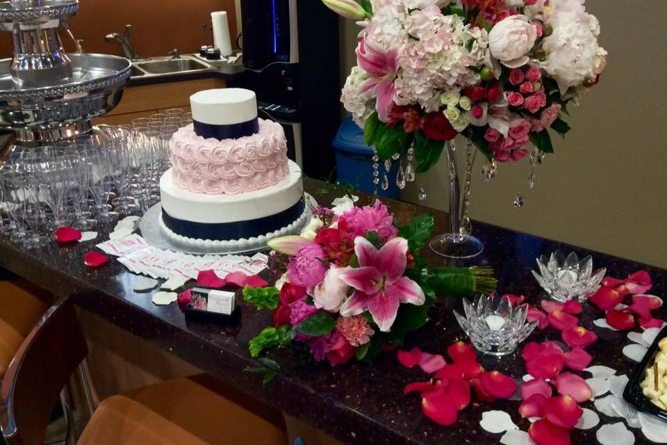 Cake surrounded by flowers