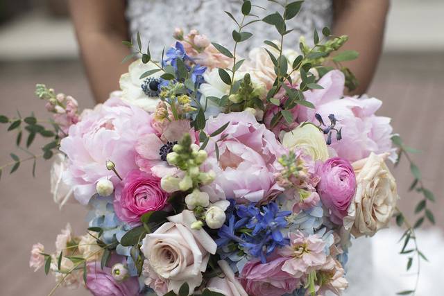Image by Dustin Lewis. Vivid Expressions LLC custom Design Bridal Bouquet.  Event design, flowers, and decor by Vivid Expressions for client's wedding reception at The Historic Post Office, Hampton, Virginia.  Wedding Stylist.  Event Design and Floral Design presentation.  Event planning, wedding planning, wedding design, event design, wedding flowers, event flowers and decor.  Luxury wedding, Luxury event design planning, destination Wedding