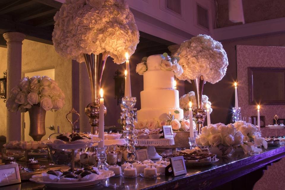 Wedding cake setup with candles