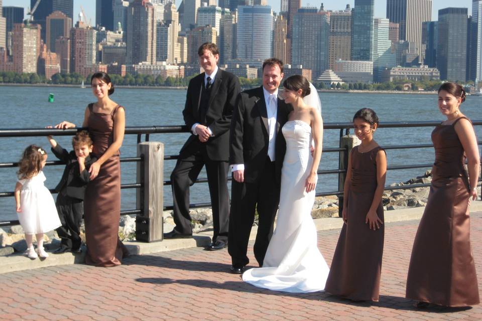 The couple with the bridesmaids and groomsmen