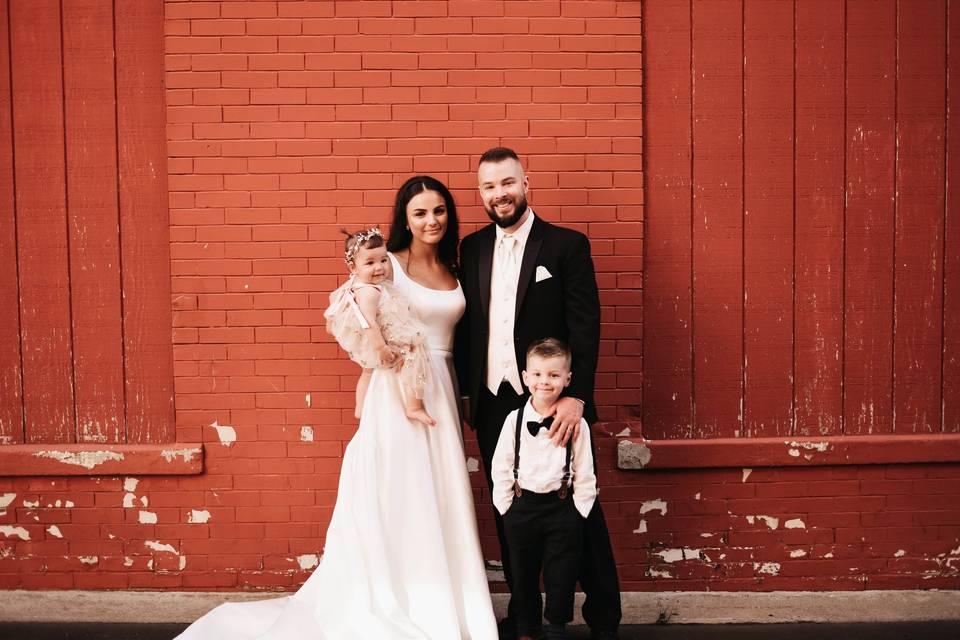 Bride and groom with kids