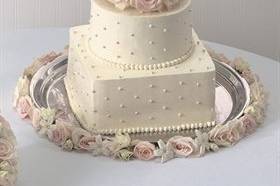 White wedding cake with flowers