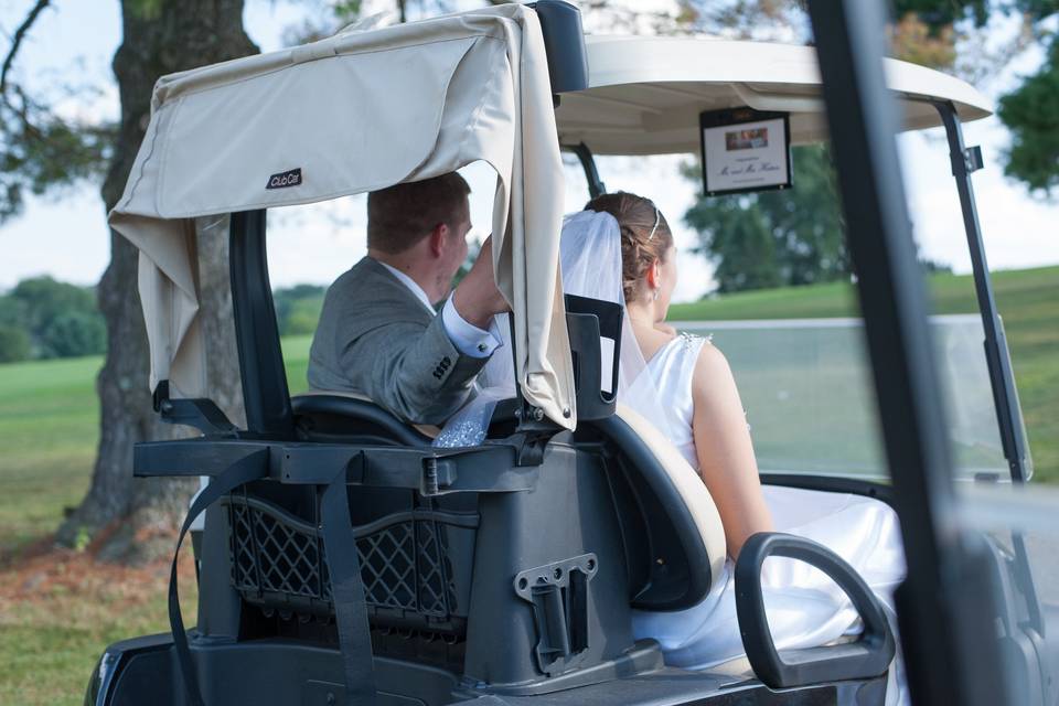 Couple in the golf cart