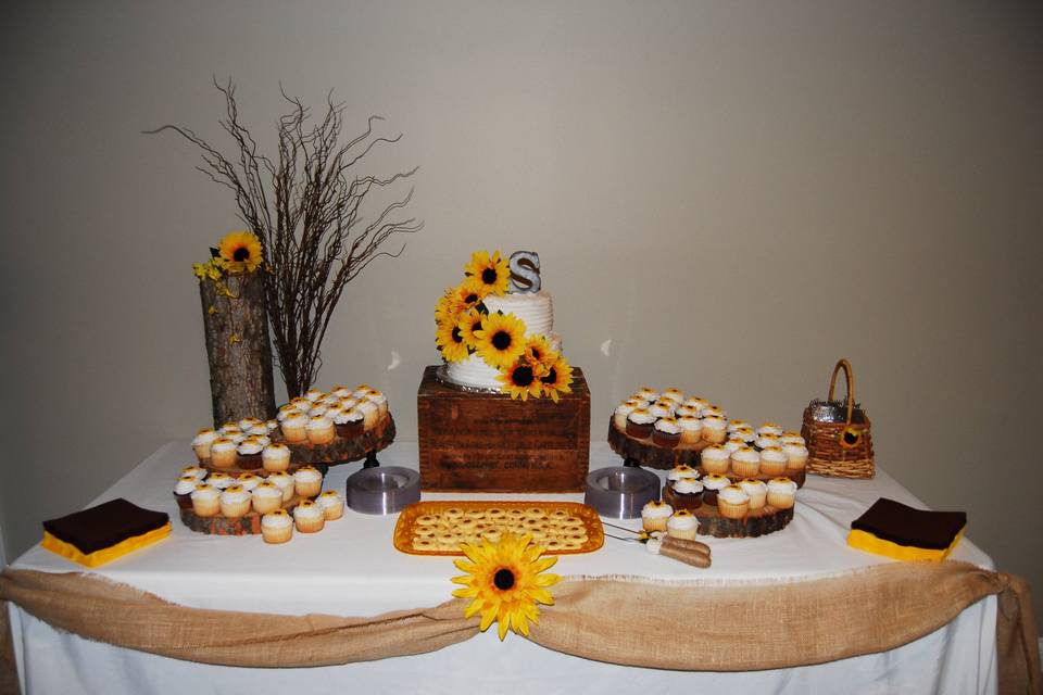 Wedding cake and cupcakes