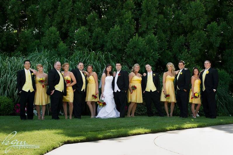 The couple with their bridesmaids and groomsmen