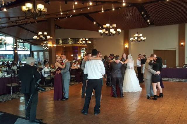 The couple and their guests dancing