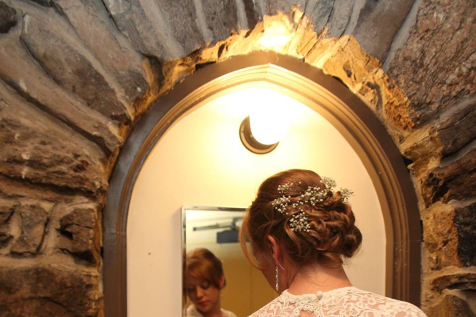 Bride looing in a mirror
