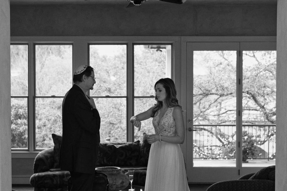 A bride talks with the Rabbi
