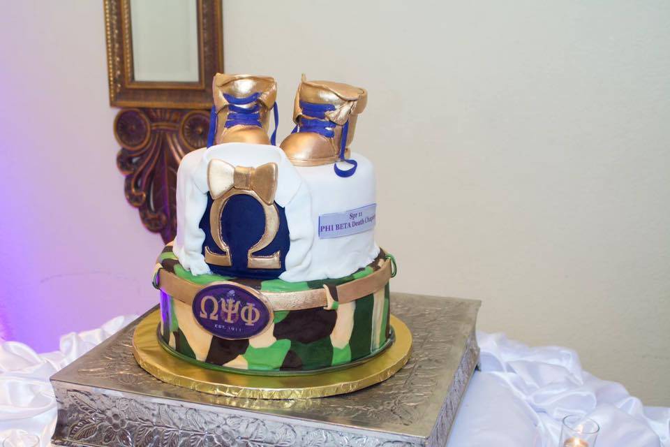 Love the groom's Omega cake