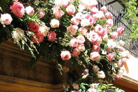 Stunning, beautiful, artistic doors at Trois Estates.  I love being able to utilize the space above and bring it into the celebration...  alive with hundreds of roses and flowers.  It is stunning and the atmosphere comes alive ~ and smells wonderful.