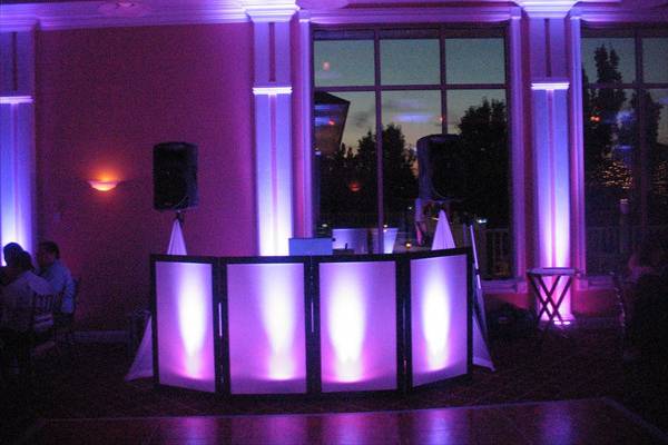 DJ booth with uplighting