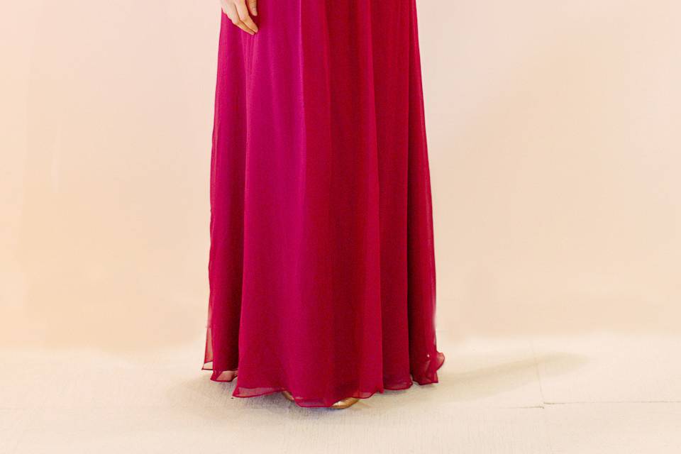 Bisou
Strapless empire waist gown with rose detail at center of bust.
Available in multiple colors!