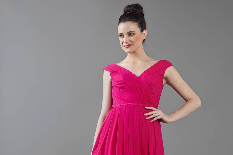 Meadow
V-neck rouched bodice gown with party skirt and buttons on back.
Available in various colors!