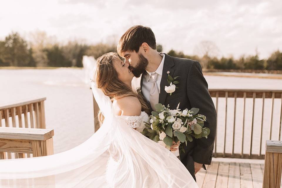 Bride and groom kiss