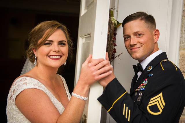 Couple photo by a door