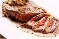 med rare steak served with ajus