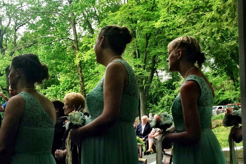 Gorgeous in pale green with some very fancy cowboy boots! Outdoor wedding in Cascade Park, New Castle, PA - The view from the musicians' tent.