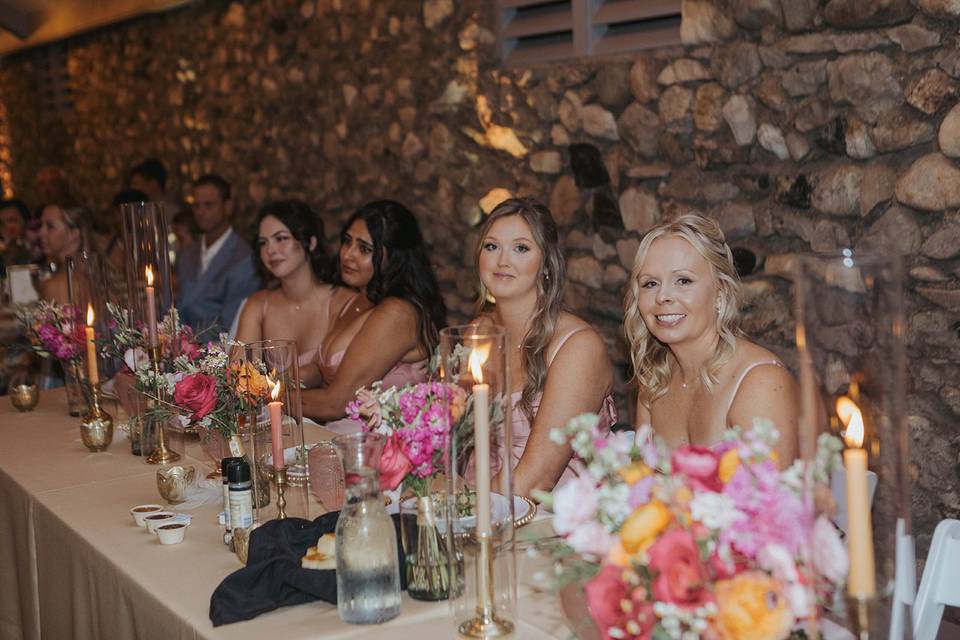 Lit candles on the head table