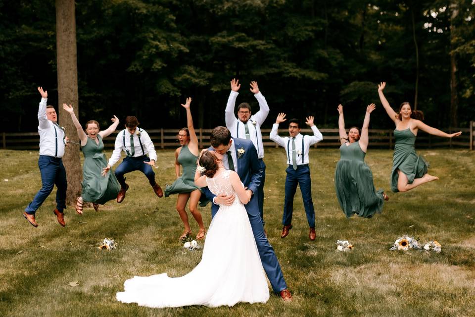 Wedding party jumping