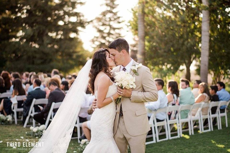 Newlyweds kissing