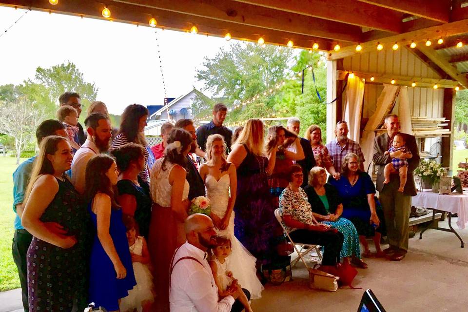 Bride and groom with guests