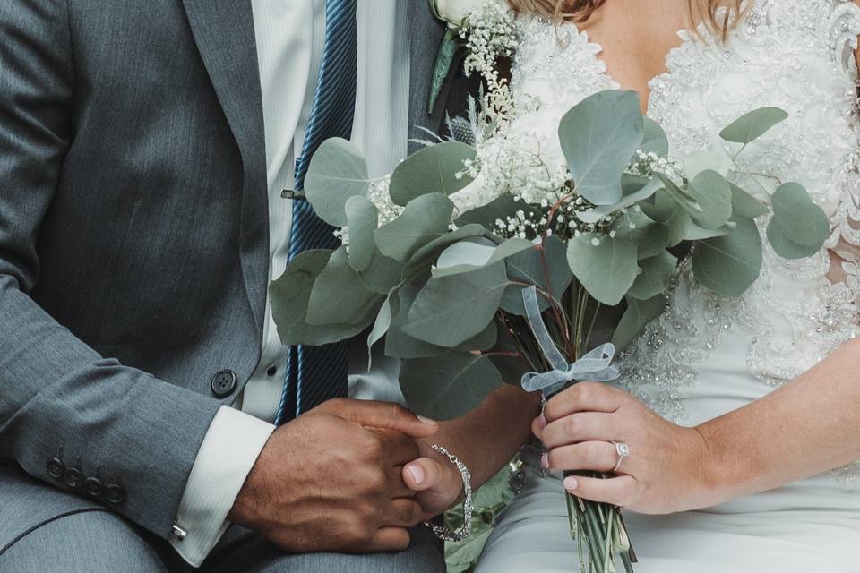 Bride, groom, and flowers