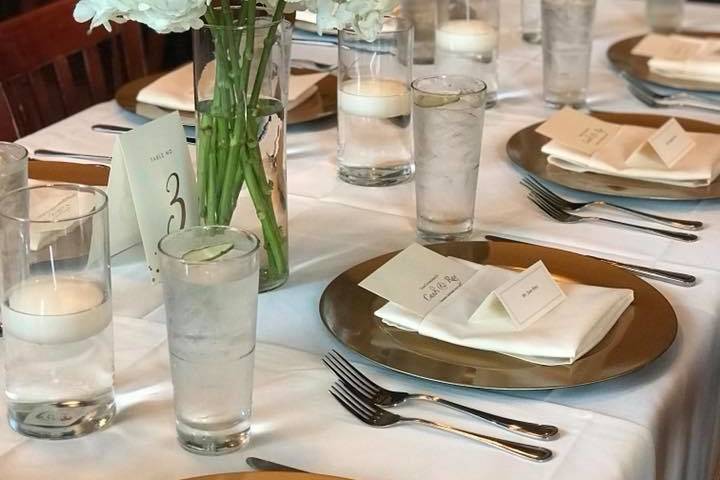 Table setting and floral centerpiece