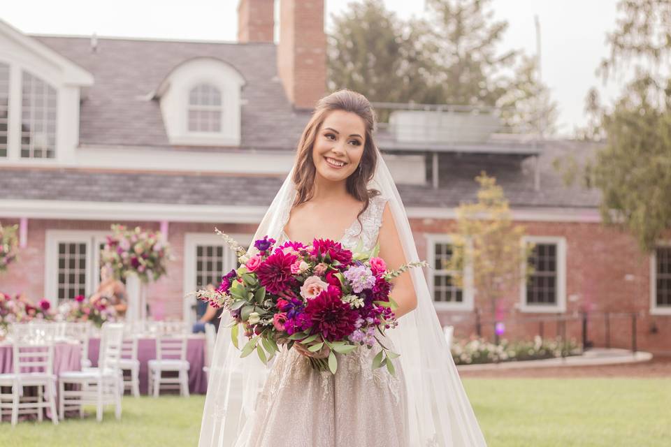 Happy bride with bouquet