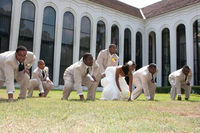 ​Couple with their groomsmen