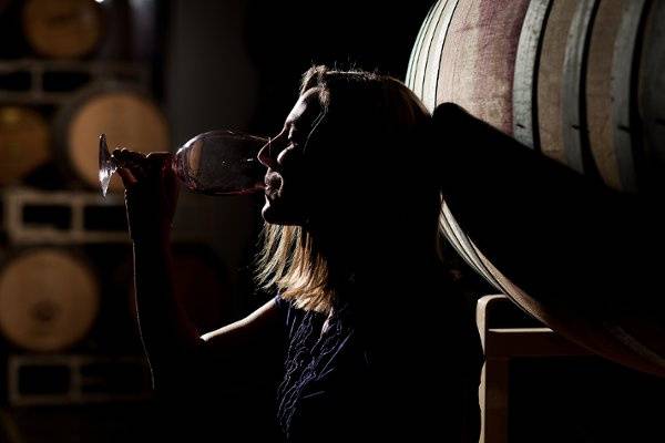 Bride drinking wine