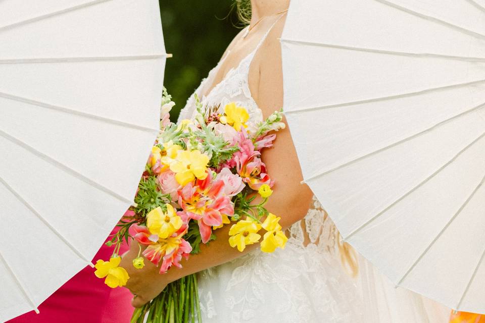Bride, umbrella, flowers