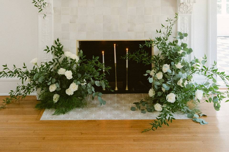 Fireplace, greenery, roses