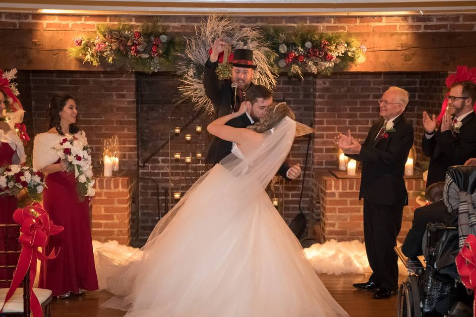 Groom dipping the bride