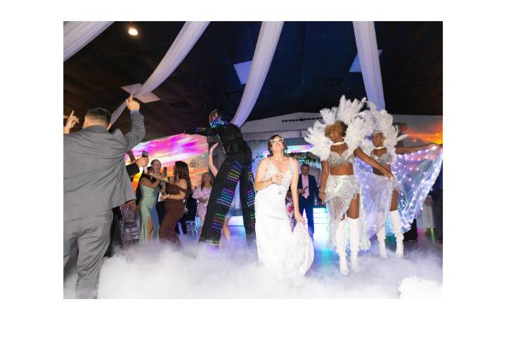Stilt Walkers Dancing on Cloud