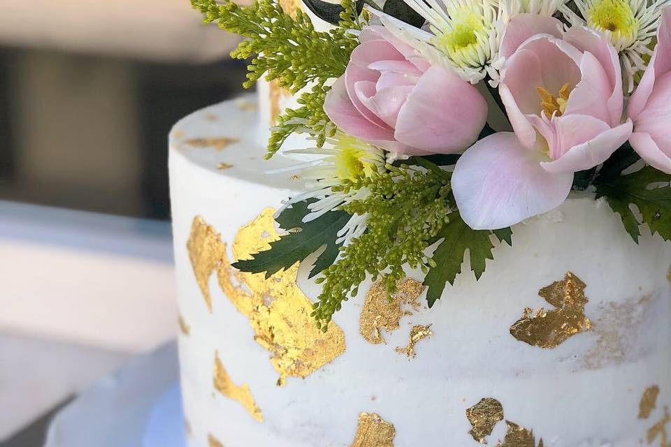 Wedding cake with gold leaf