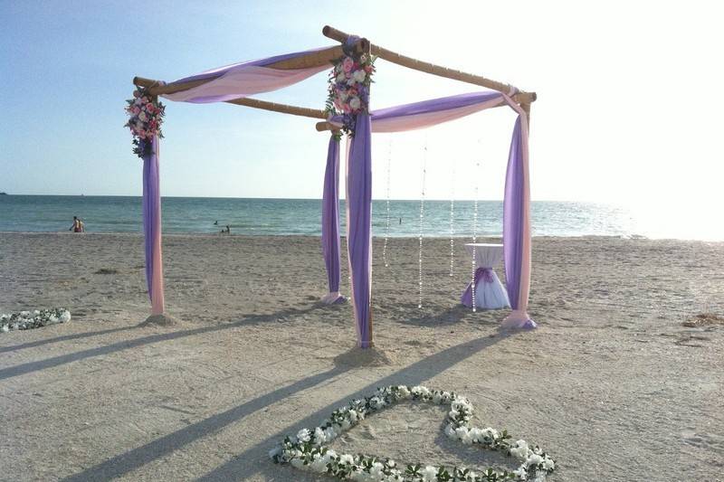Purple wedding arbor and floral heart